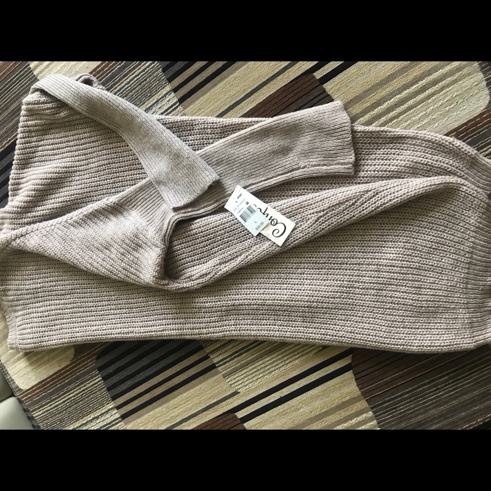 Beige sweater.